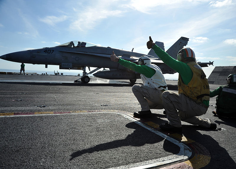 800px Flickr Official U.S. Navy Imagery Hornet prepares to launch aboard USS Abraham Lincoln.