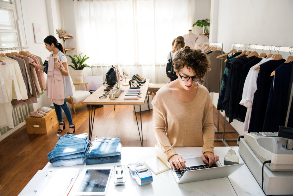 female business owner is using laptop copy