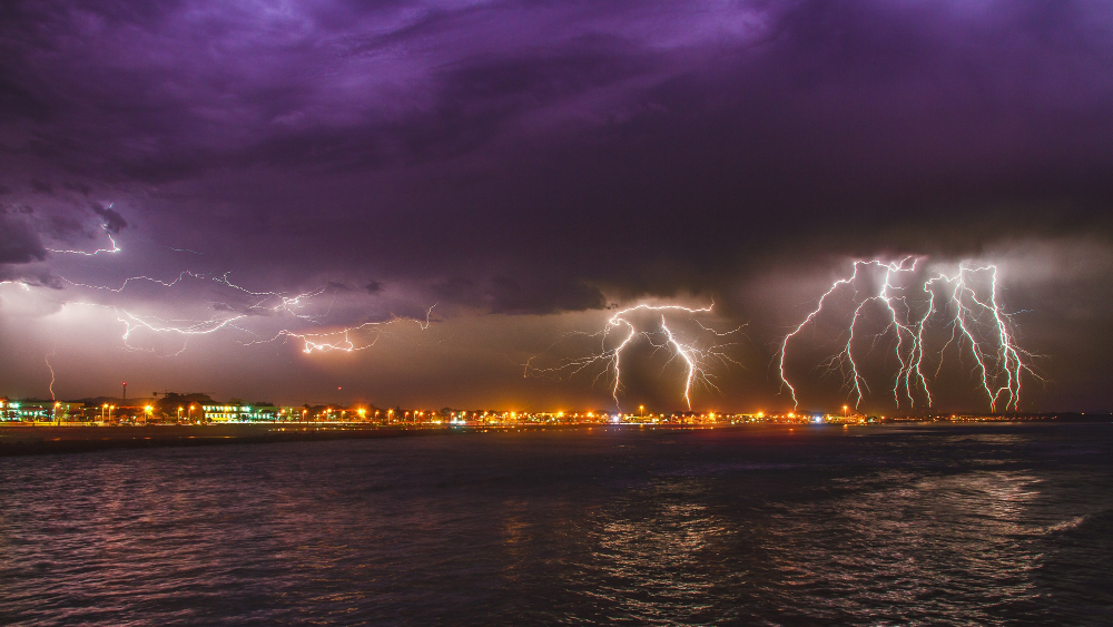 breathtaking intense lightning storm ocean city esposende portugal