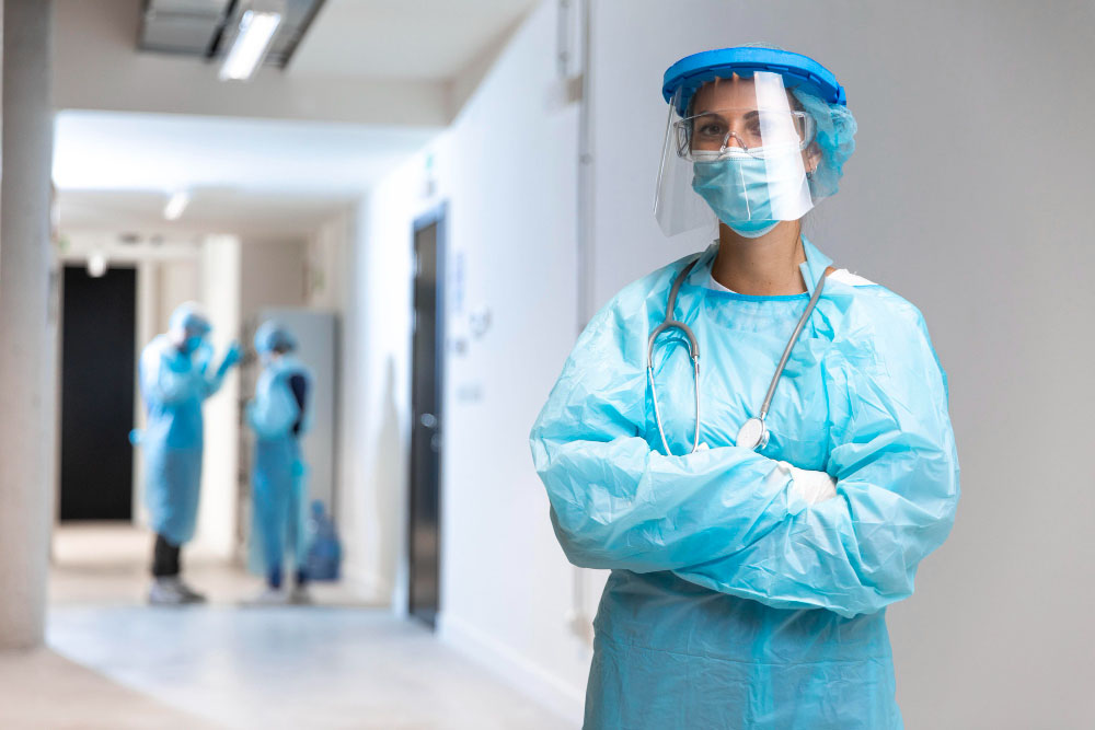 front view woman wearing protective wear hospital copy