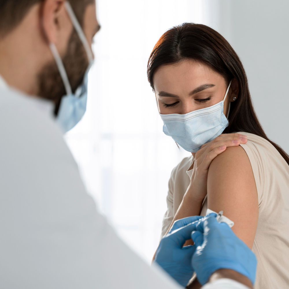 doctor doing vaccine patient