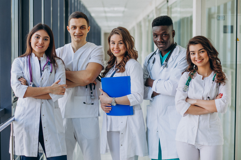 team young specialist doctors standing corridor hospital