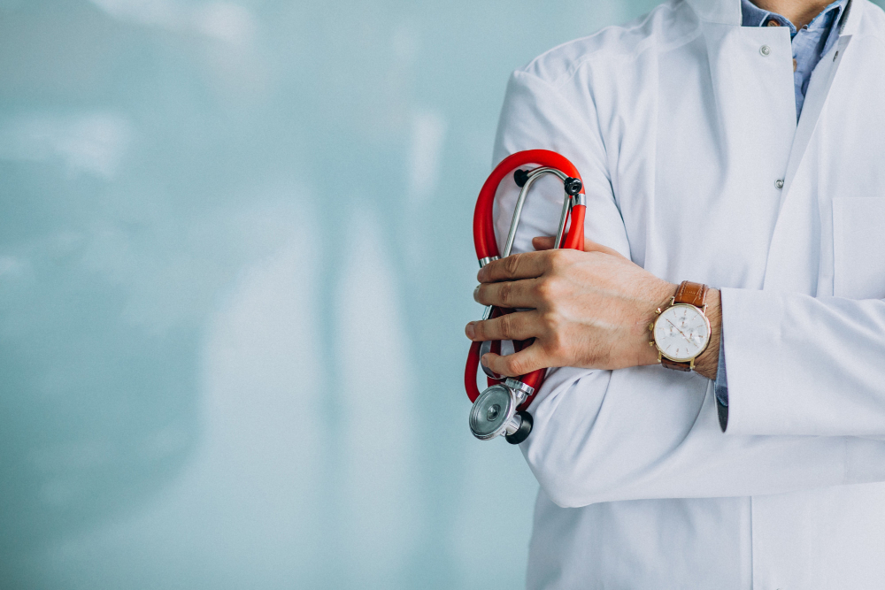 young handsome physician medical robe with stethoscope