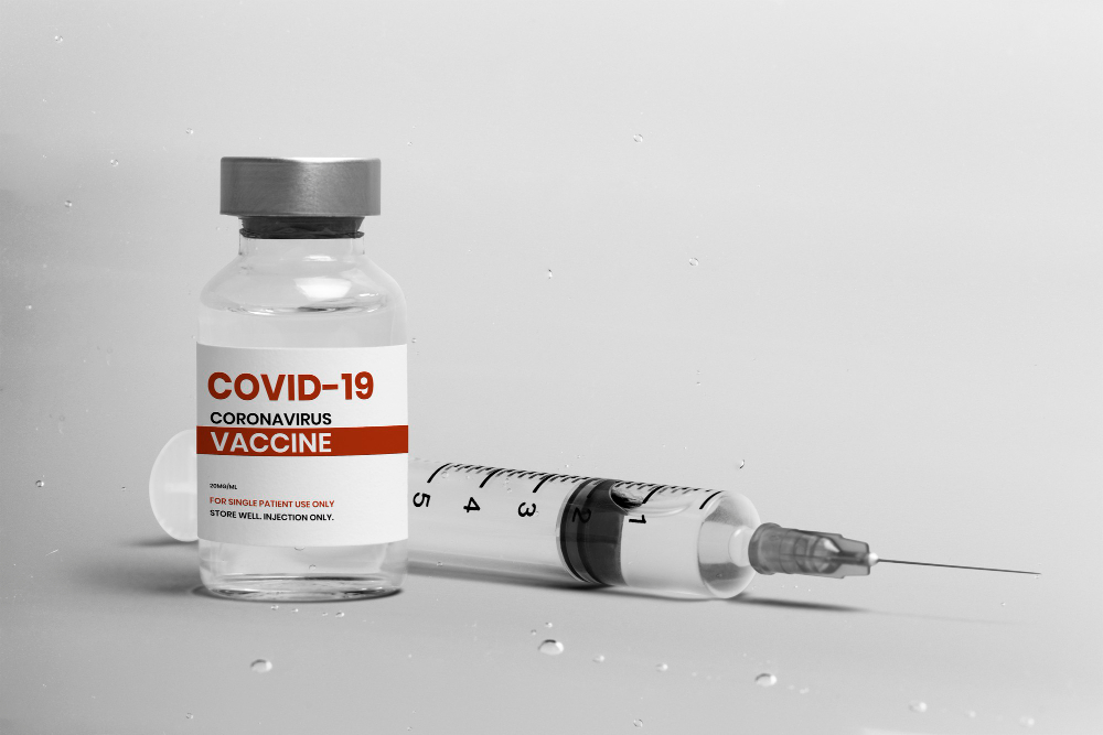 covid 19 vaccine injection glass bottle with syringe