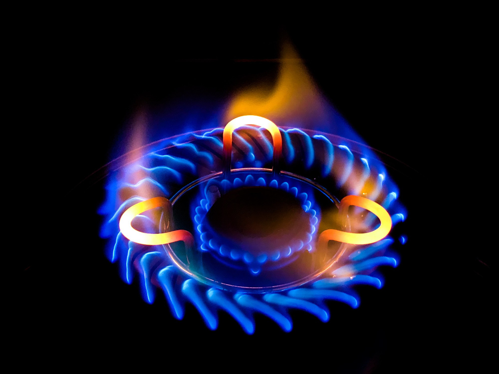 closeup shot beautiful blue flame gas stove