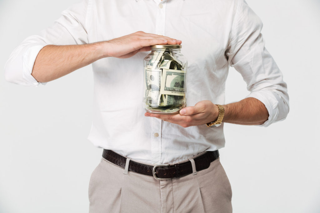 close up portrait man shirt holding jar