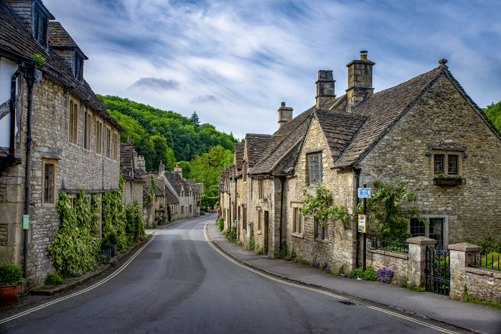 shot brick stone houses main street castle combe uk