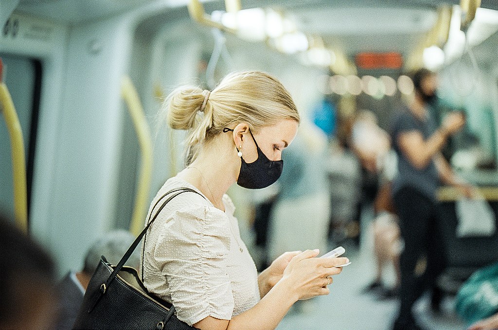 A woman wearing a protective face mask