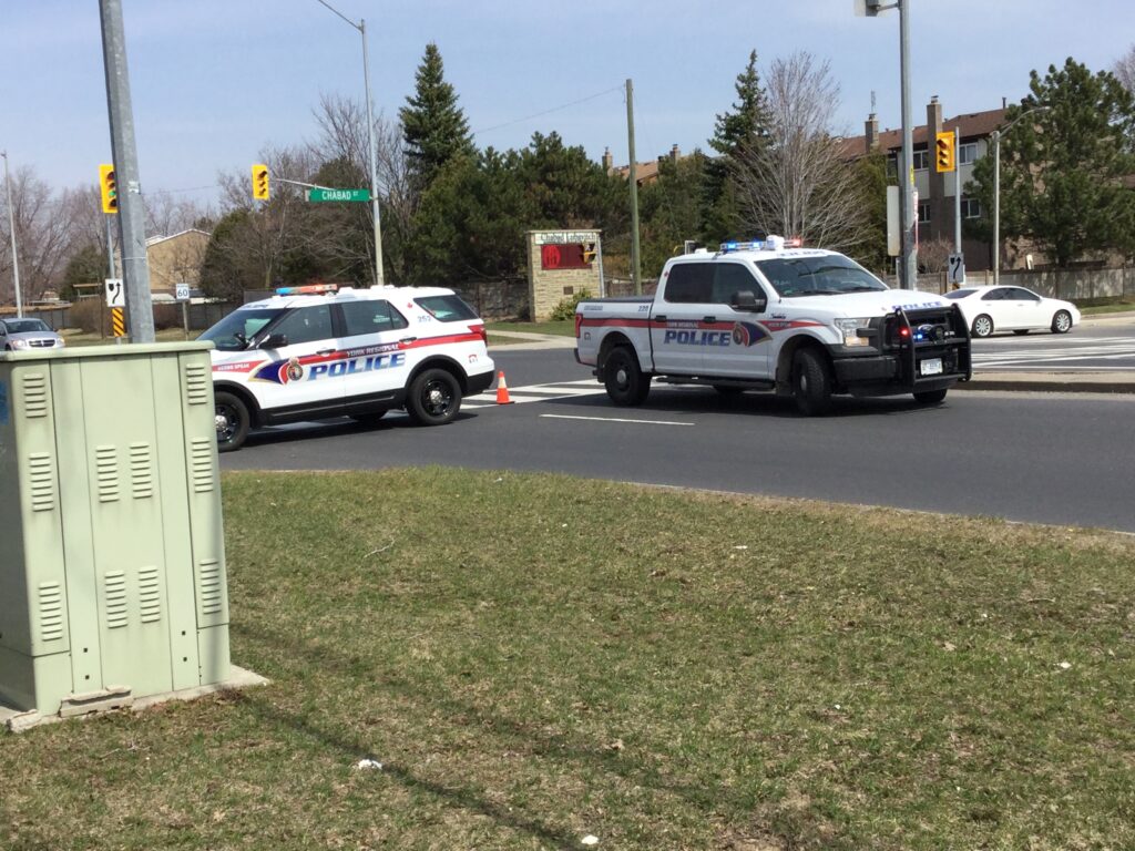 York Regional Police vehicles on the scene of a traffic collision in Vaughan Ontario